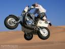 Flying a V-Rod Sidecar in the desert sand dunes, ready for Dakar Rally